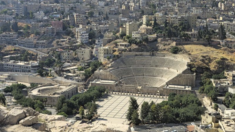 The Roman Theatre of Amman seen from the Citadel, surrounded by the houses of the city